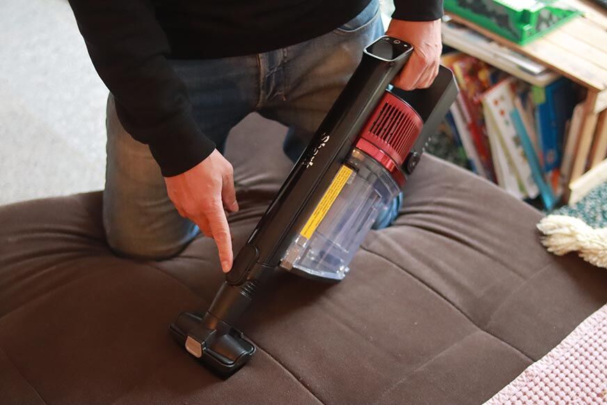 You can see how to clean upholstery with the Shark Anti Hair Wrap hand vacuum. 